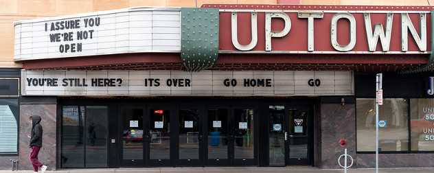 movie theater marquee with movie quotes indicating it is closed during the COVID-19 pandemic.