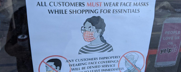 window sign specifying that customers must properly wear anti-COVID-19 masks while shopping to be served.