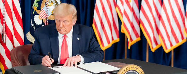 President Trump signs a memorandum for the continued relief of student loan payments during the COVID-19 pandemic at a news conference in Bedminster, N.J.