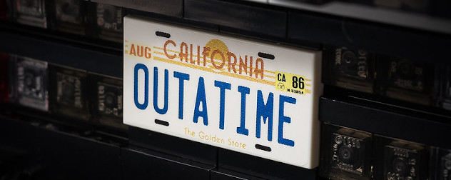 detail of a Lego model of the Delorean from 'Back to the Future,' feating the 'Outatime' license plate.