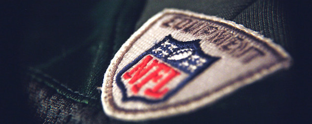 detail of an NFL logo on a clothing item.