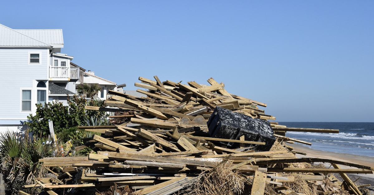 debris on a beach following Hurricane Matthew.