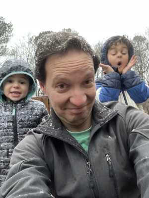 Paul Jacobs and his sons in the snow.