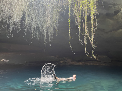 Mamie Odom swimming with flippers.